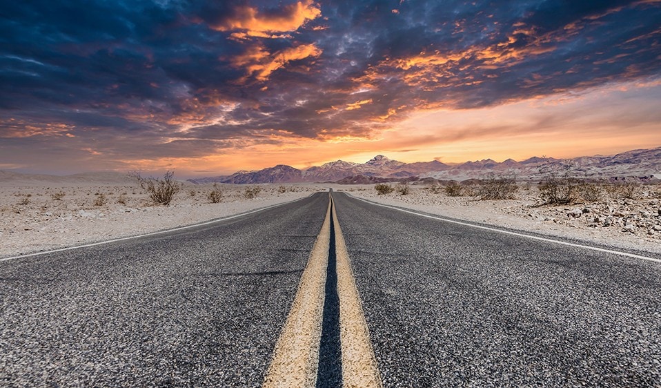 A Texas road with a yellow line on it.